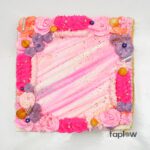 Pink dinosaur plush toy held by model