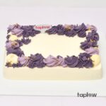 Small grey teddy bear plush held by model