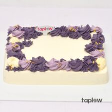 Small grey teddy bear plush held by model