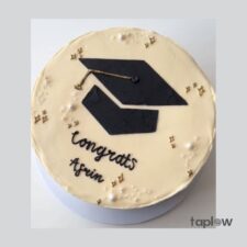 Extra-large beige teddy bear with plaid bow