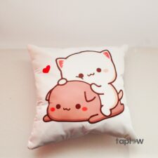 White cushion with stacked cute cat-and-dog cartoon illustration
