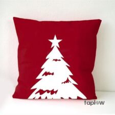 Red cushion with white Christmas-tree silhouette print