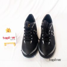 Black athletic trainers with textured upper (pair) product image.