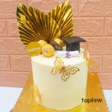 Two puppy plush toys in red outfits held by model