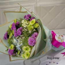 Mixed floral bouquet with purple and green filler flowers