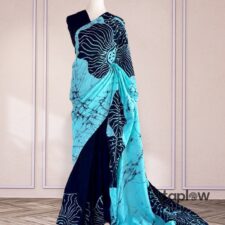 Turquoise and black printed saree on mannequin
