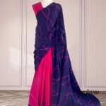 Navy and fuchsia printed saree on mannequin â€” product image.