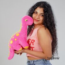 Chocolate frosted cake decorated with colorful sprinkles and cherries