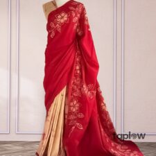Red embroidered saree draped on mannequin