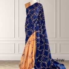 Blue saree with gold chain pattern and beige pleat detail (product photo).